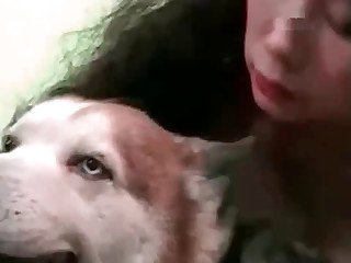 Cute dog wants to fuck its brunette owner